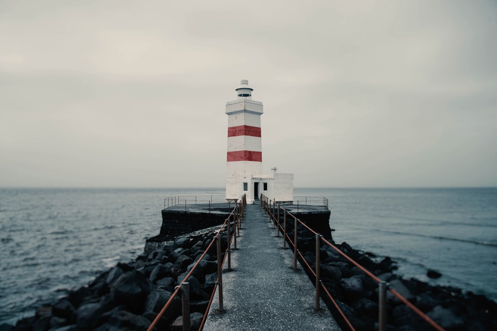 a lighthouse on a pier