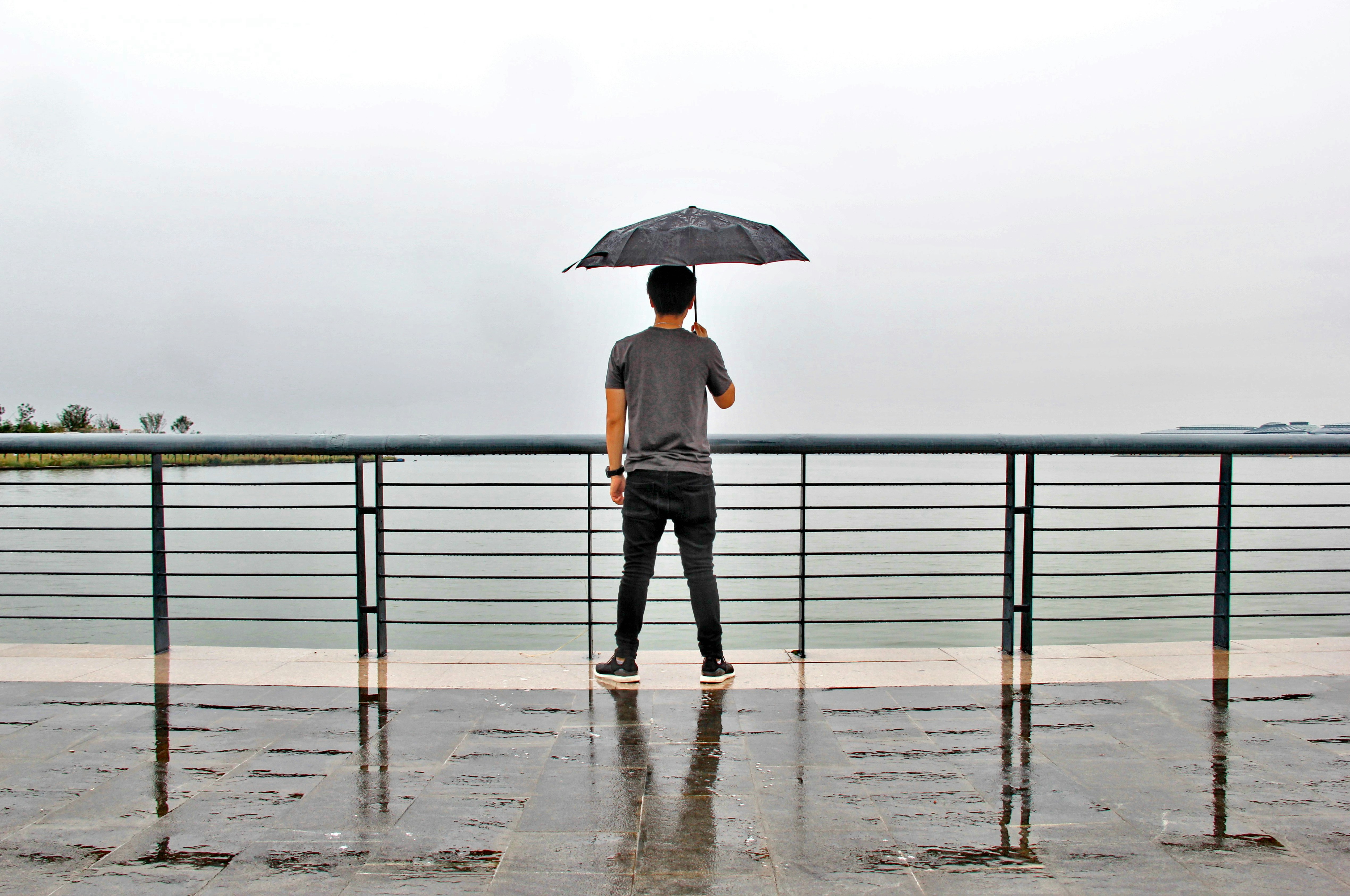 a woman holding an umbrella