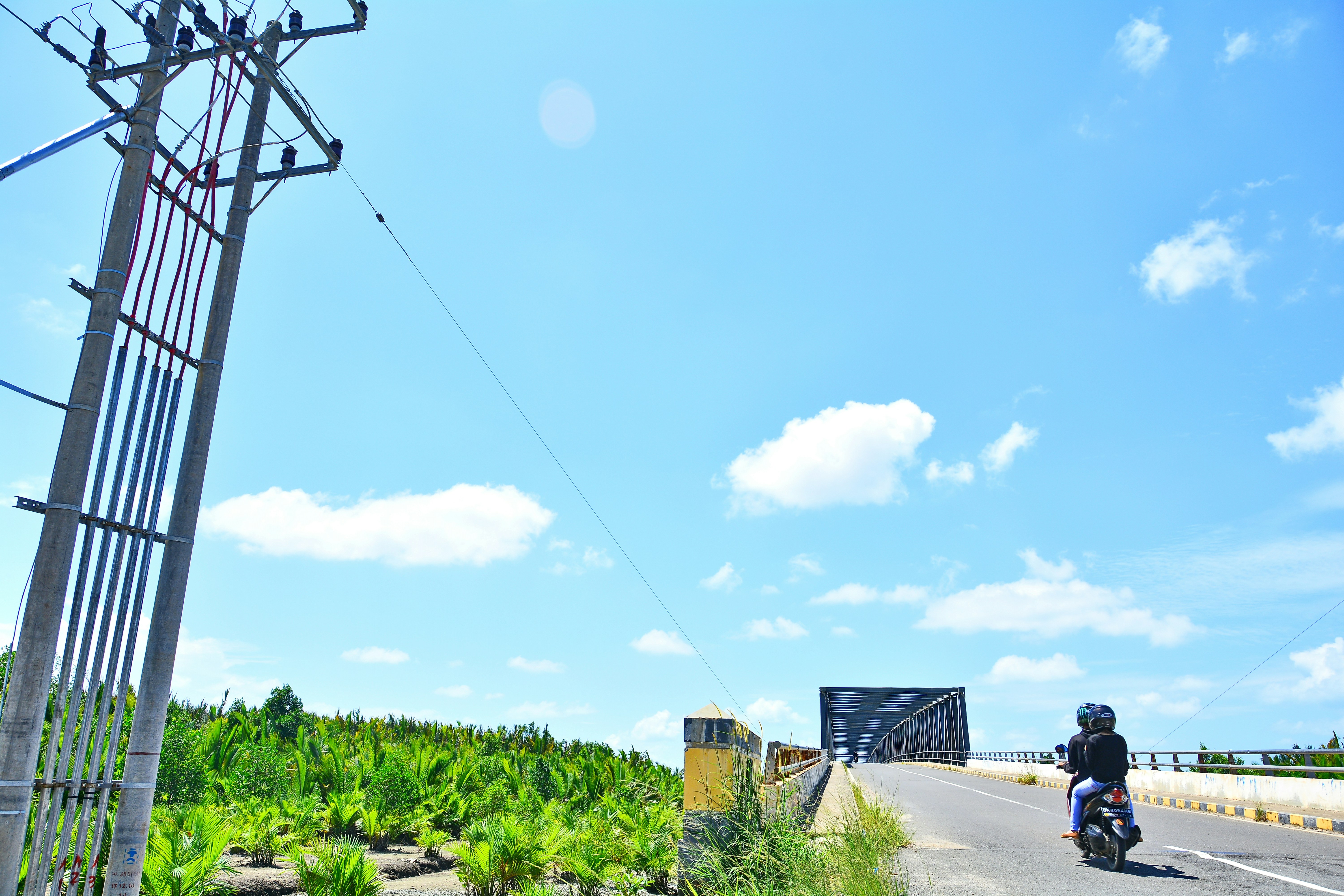 a person riding a motorcycle on a road