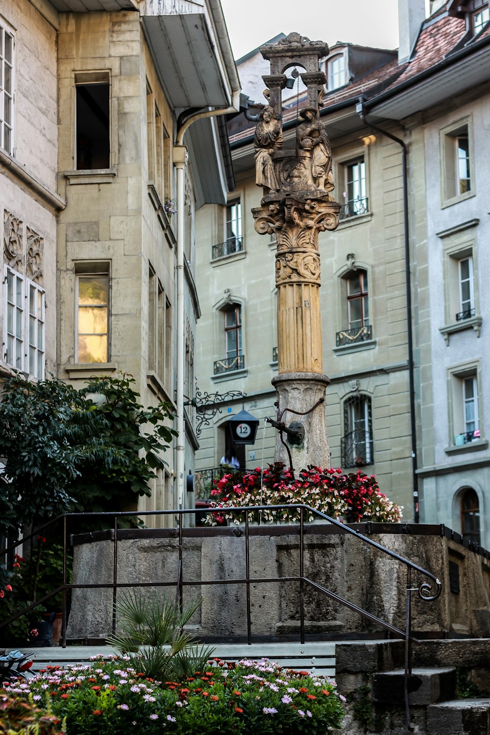 a statue in front of a building