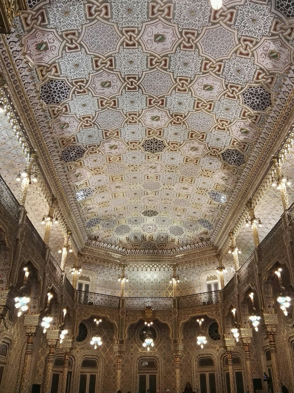 a large ornate ceiling with many lights