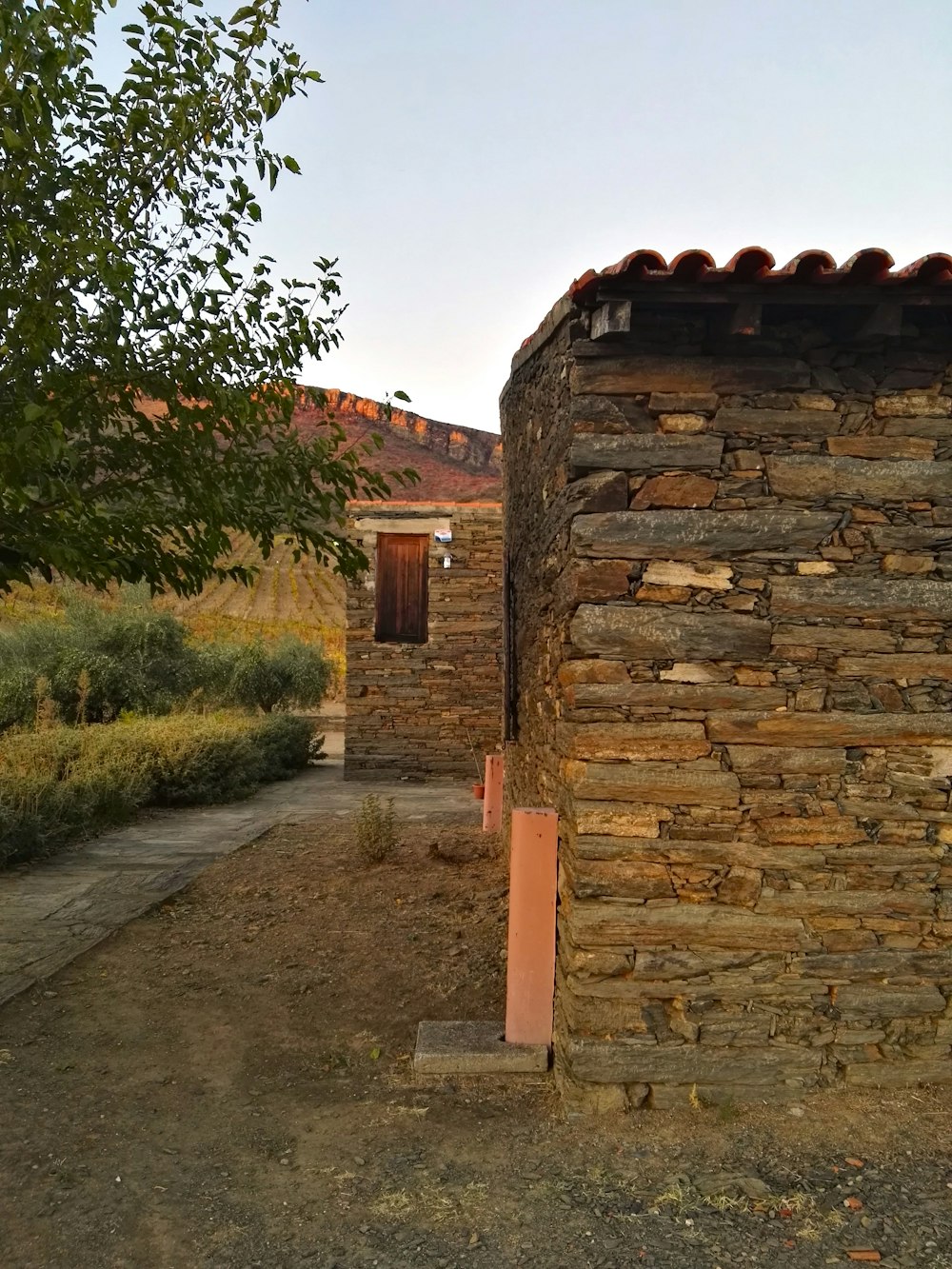 a stone wall with a door