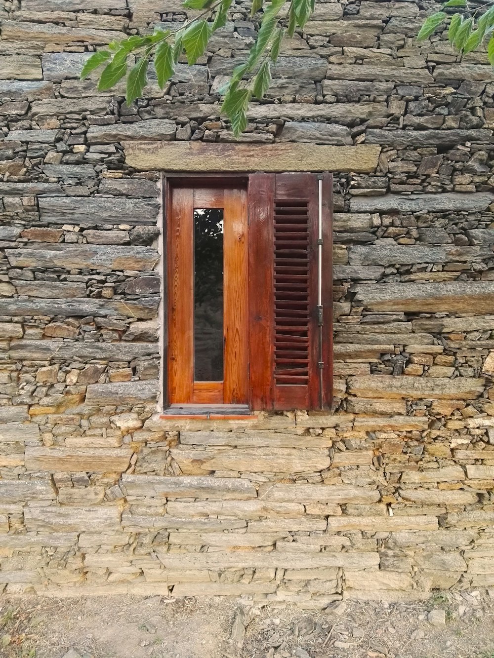 a window in a stone building