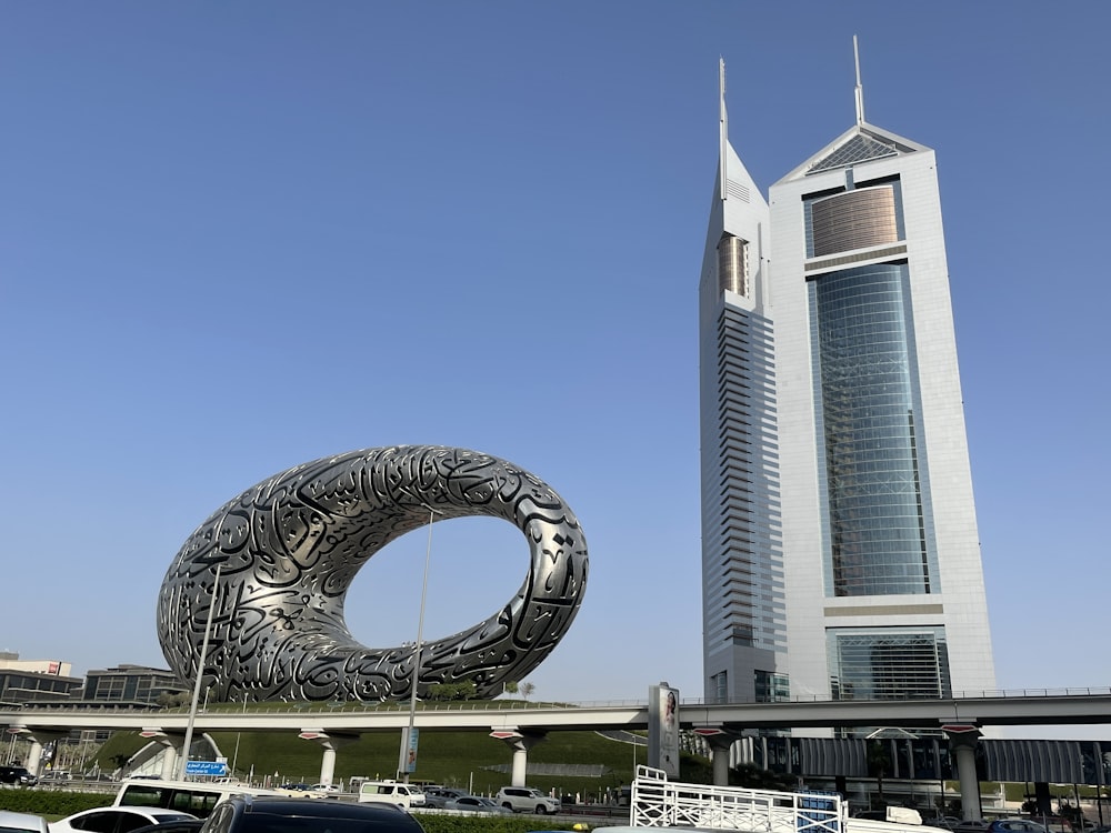 a large building with a ferris wheel in the front