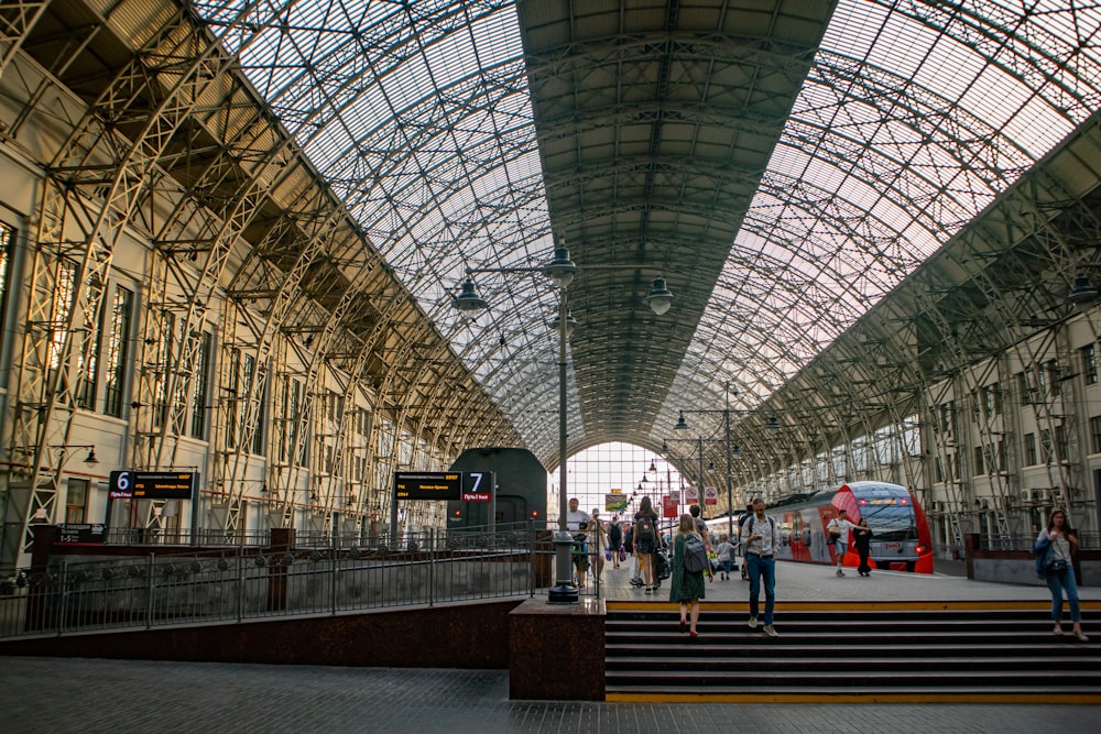 a train station with people