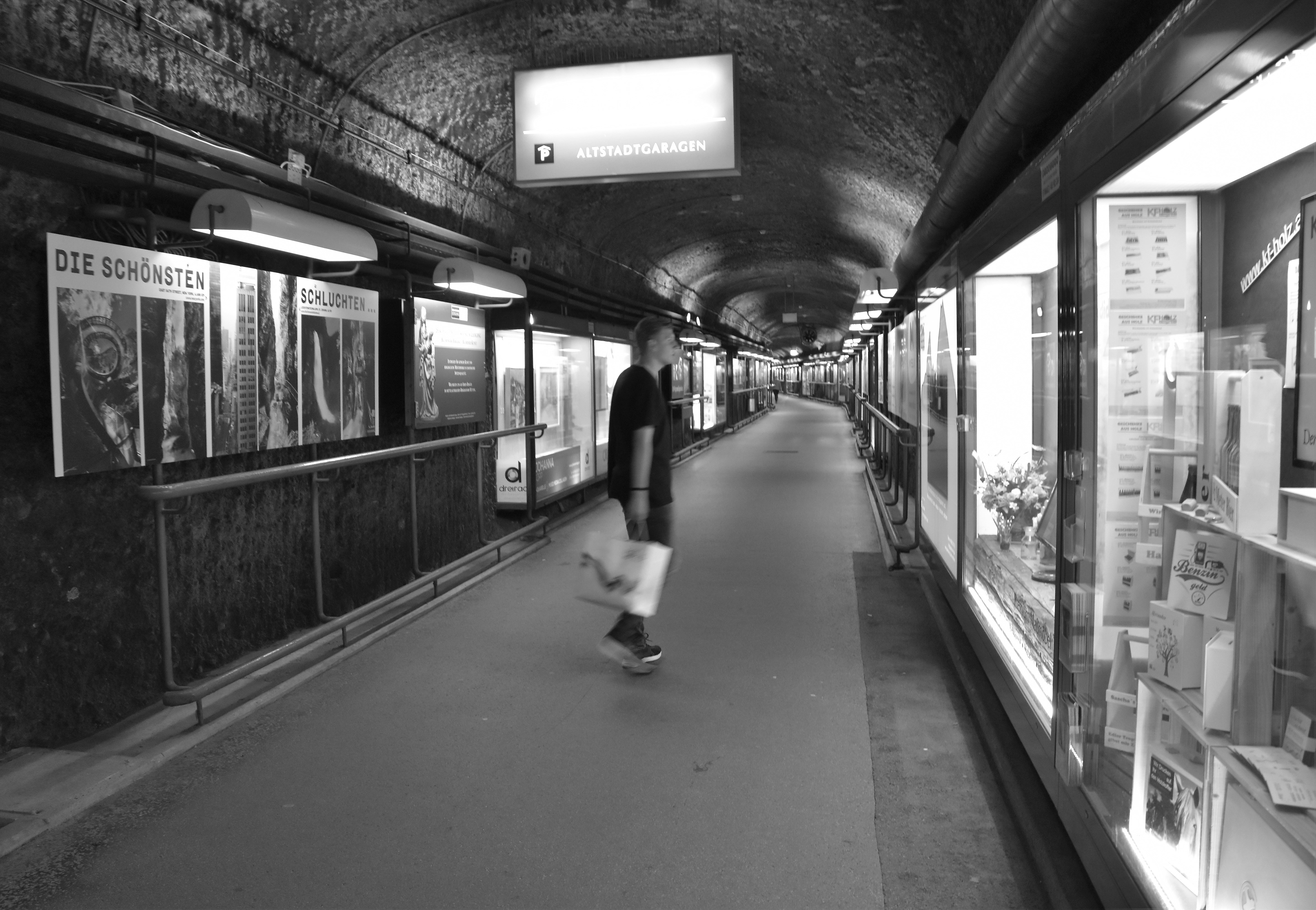 A person walking down a sidewalk