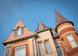 A close-up of intricate architectural details on a castle facade.