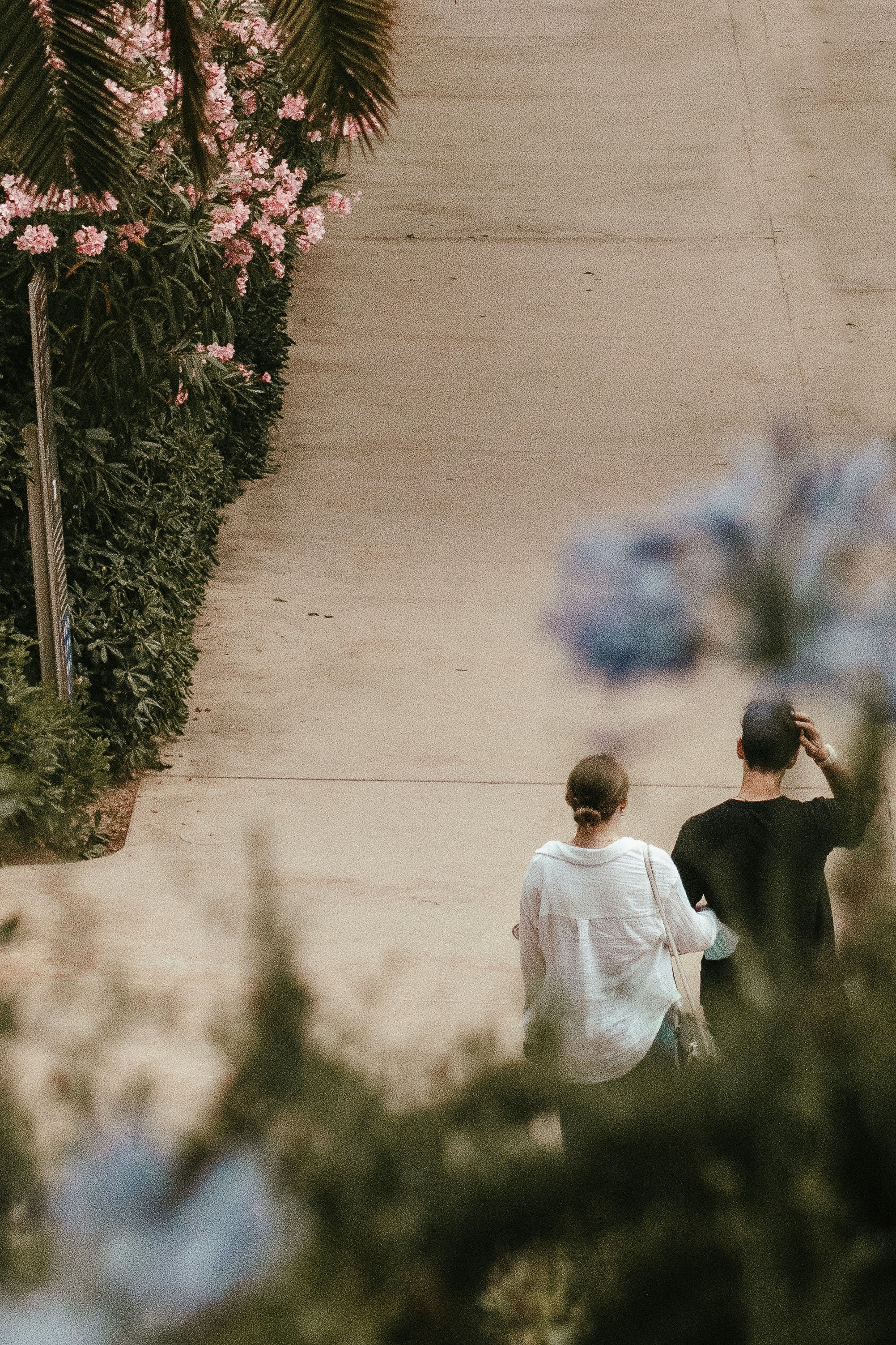 a man and woman taking a picture