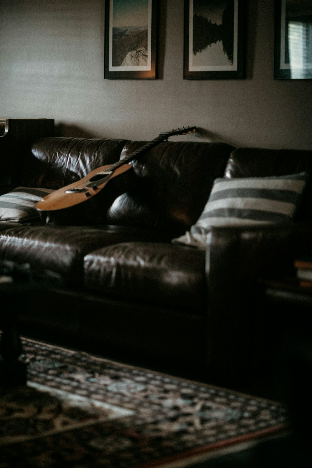 a guitar on a couch