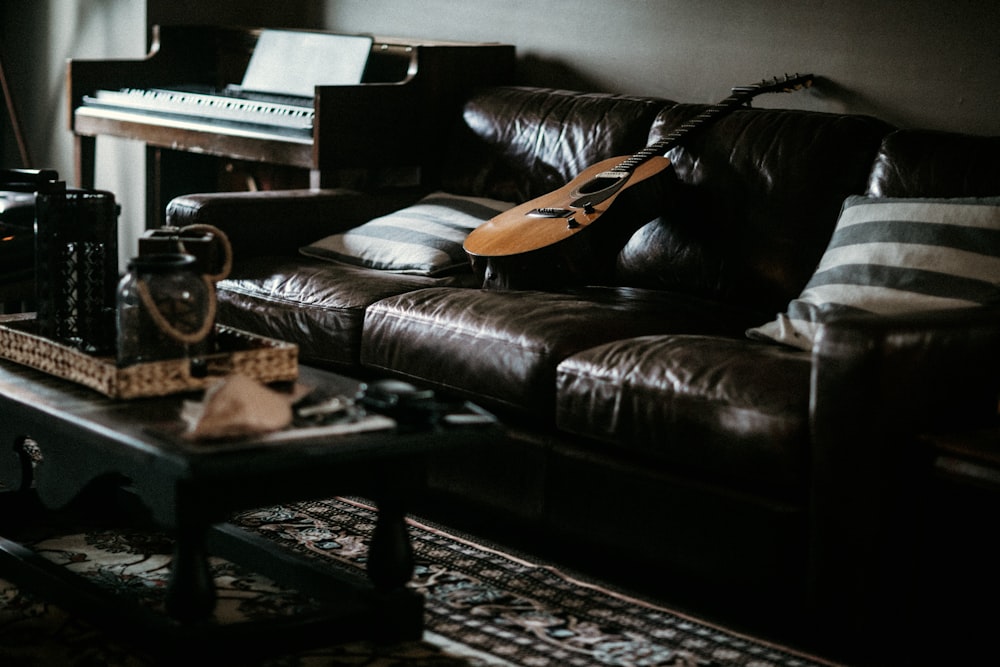 a guitar on a couch
