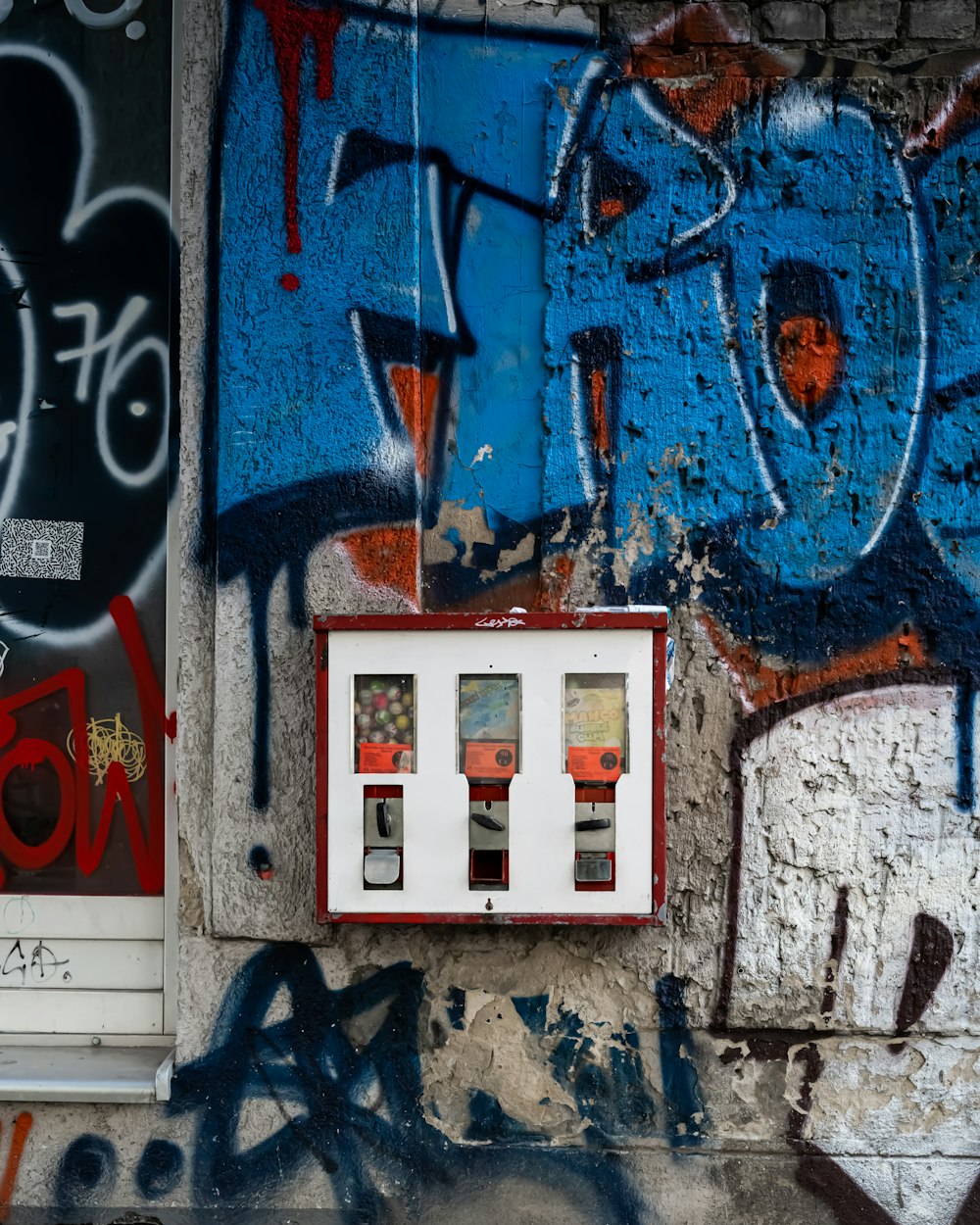 a wall with graffiti