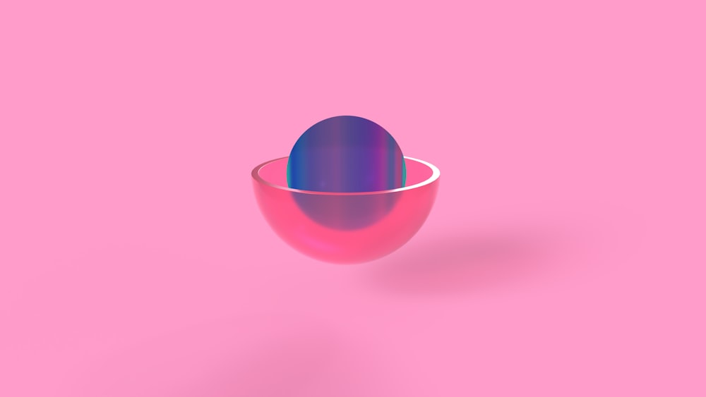 a bowl on a pink background