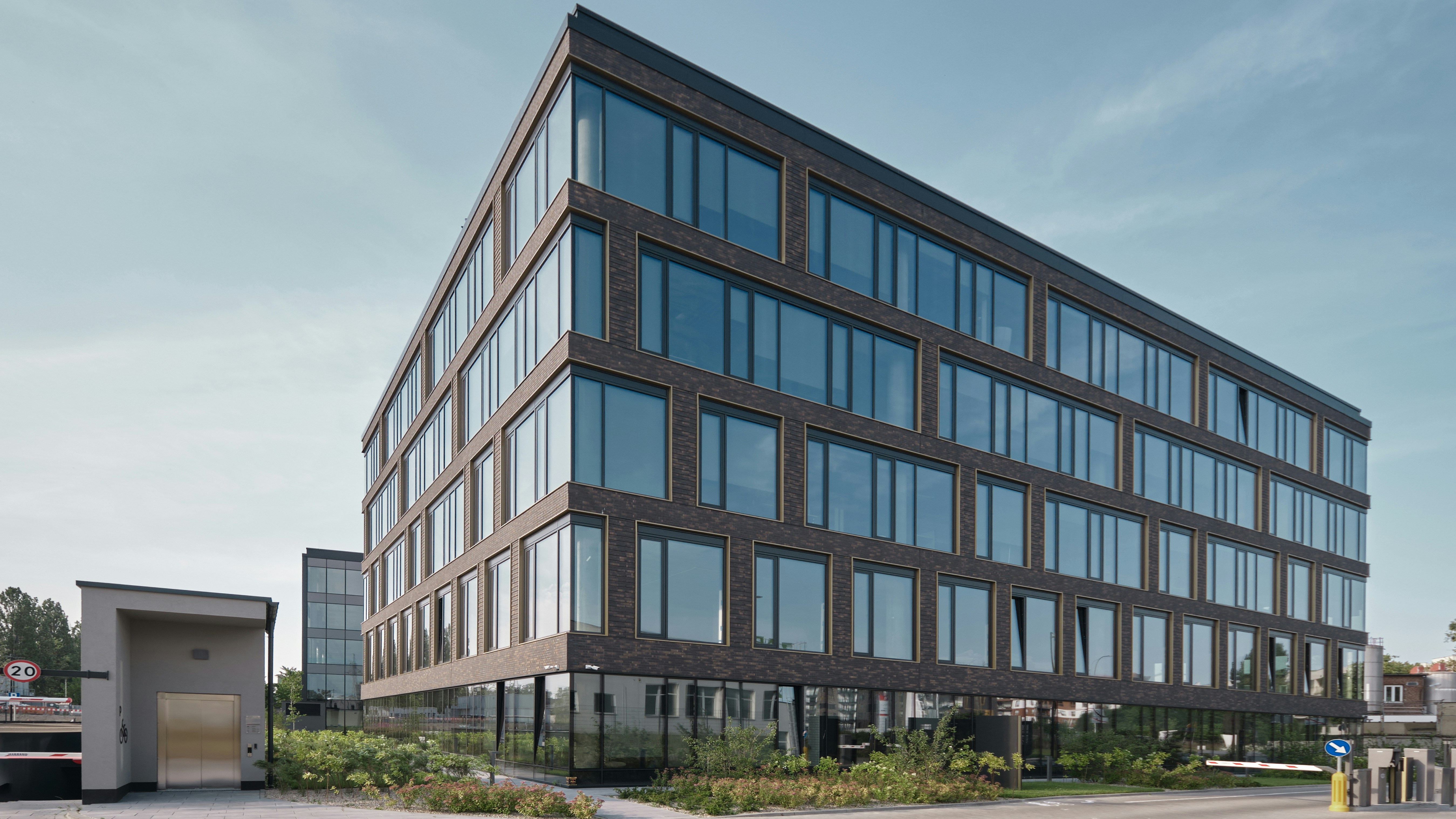 a building with many windows, Format office building located in Gdańsk, in Poland, designed by APA Wojciechowski for Torus.