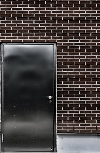 a door in a brick wall