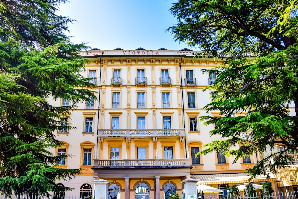 a building with trees in front of it