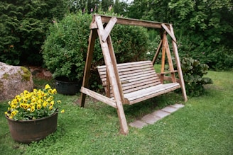 a wooden chair in a garden