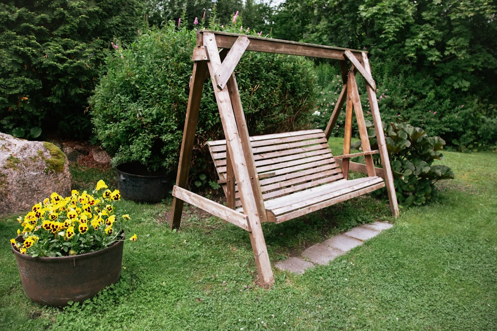 a wooden chair in a garden