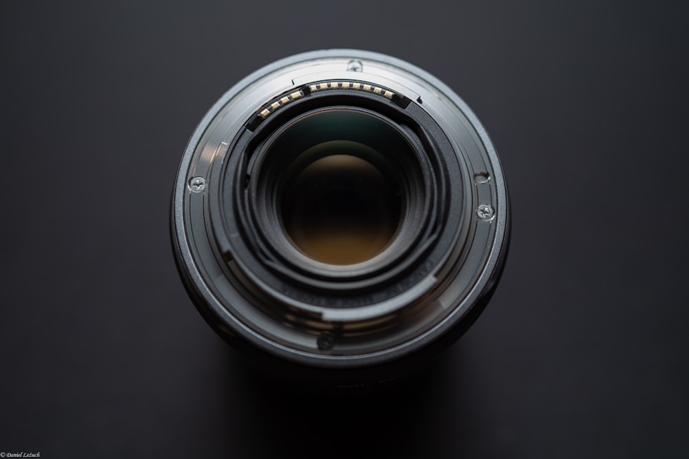 a camera lens on a black background