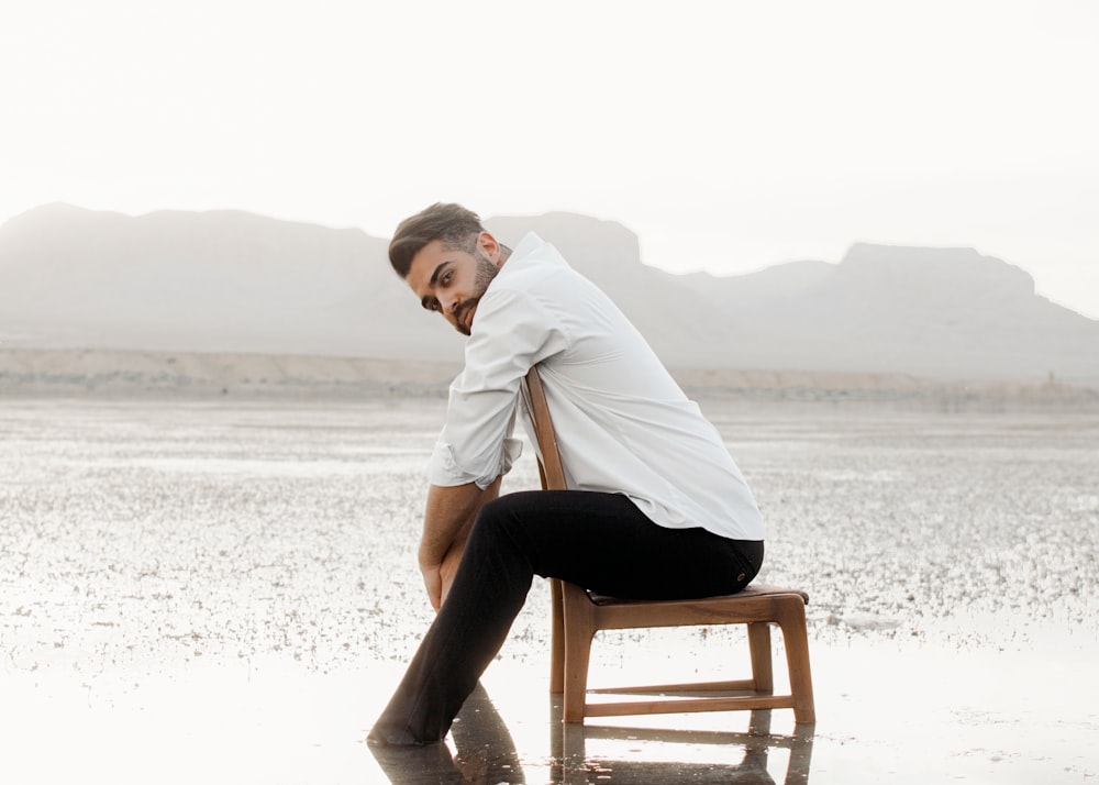 a man sitting on a chair