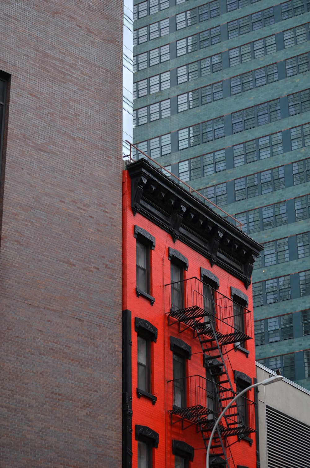 a building with a red ladder