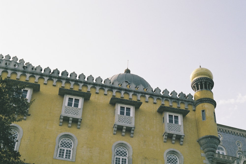 a building with a gold domed roof