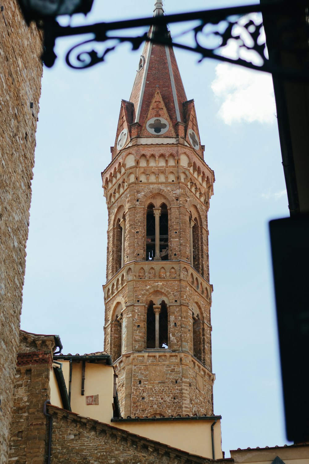 a tall building with a pointed roof