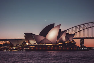 a large building with Sydney Opera House over it