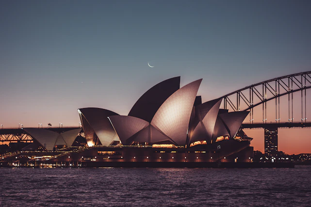 a large building with Sydney Opera House over it