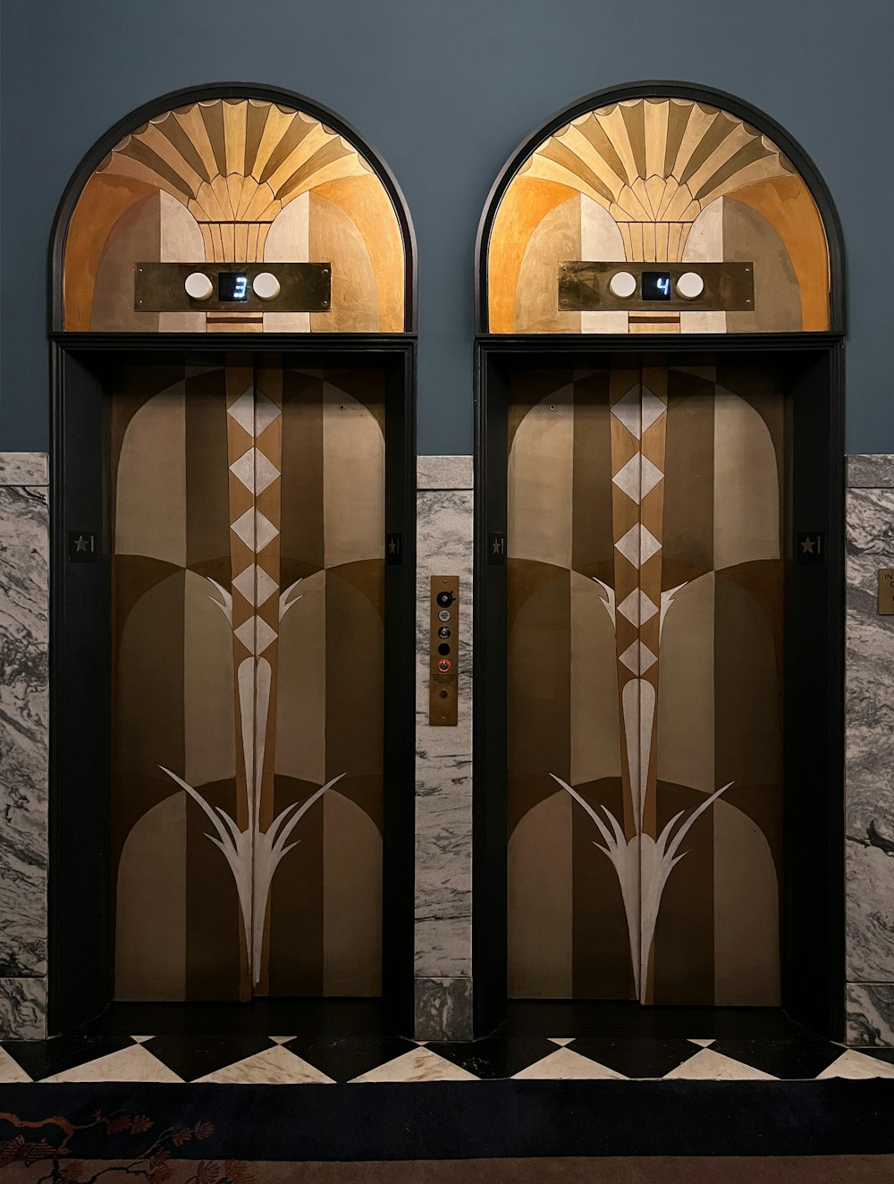a group of doors with designs on them