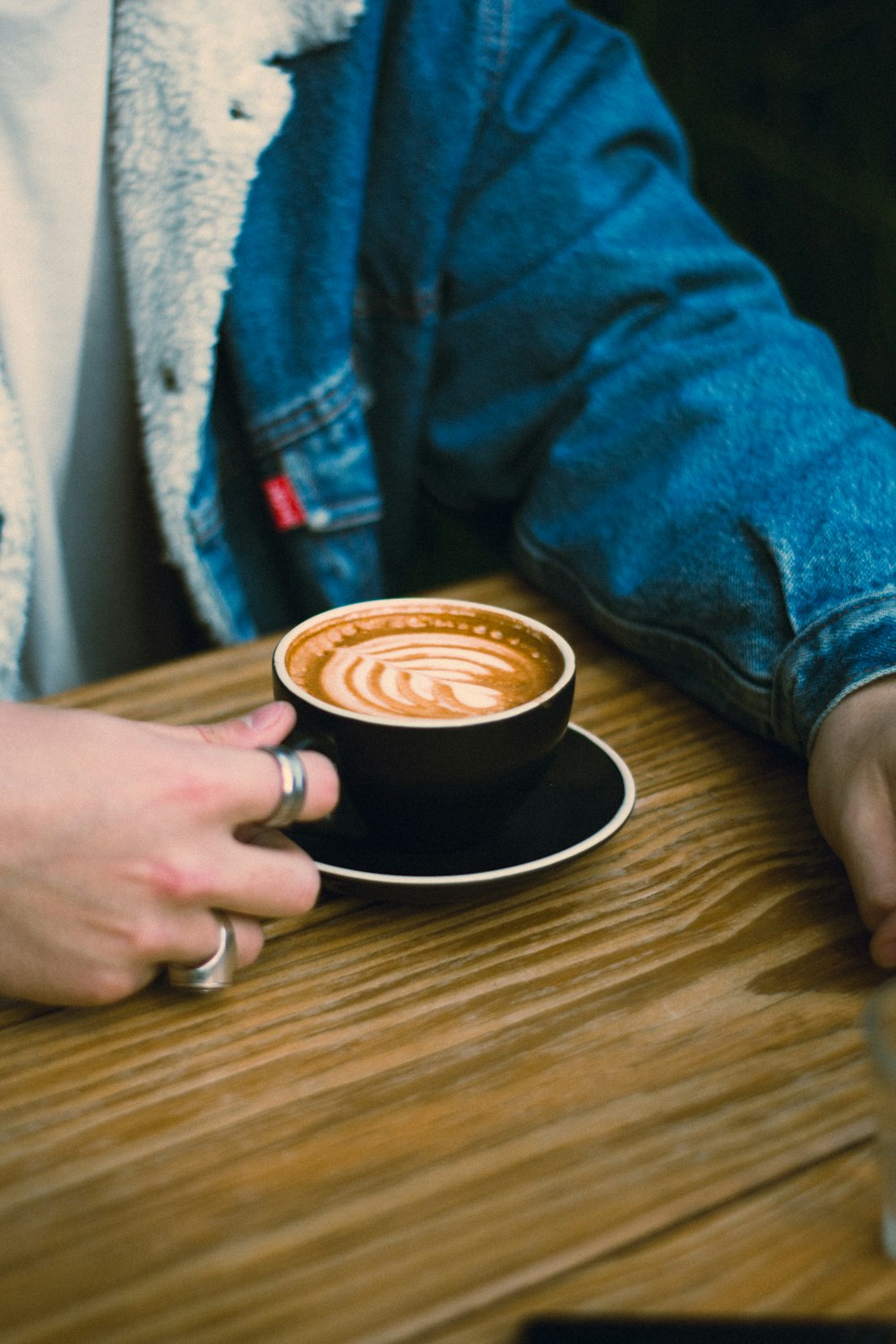 a person holding a cup