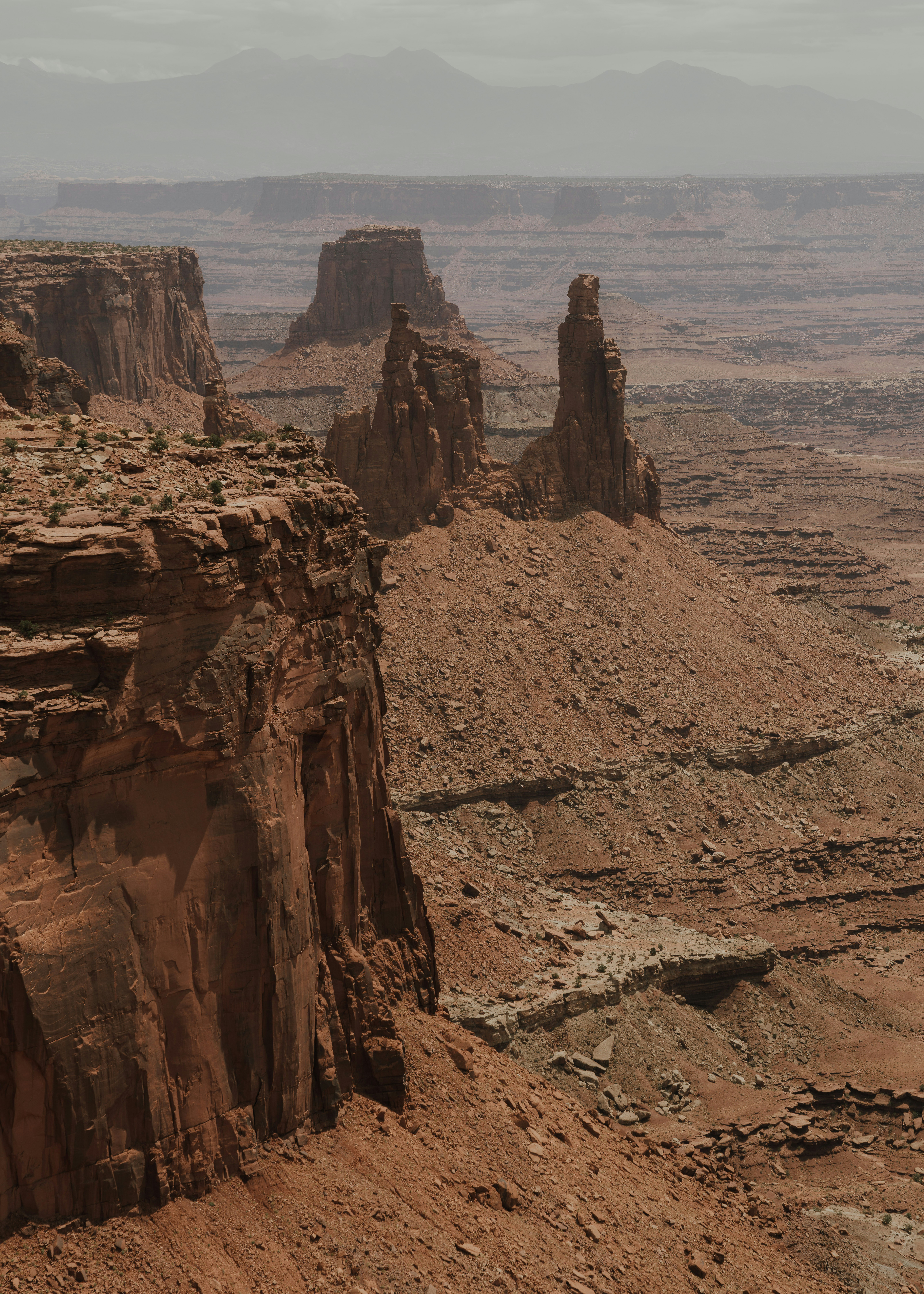 a rocky canyon with a river running through it
