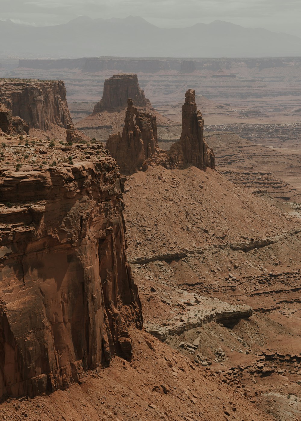 a rocky canyon with a river running through it