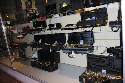 A vibrant display of various musical instruments arranged in a cozy store corner.