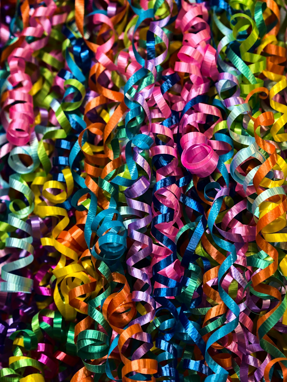 a close up of a bunch of colorful flowers