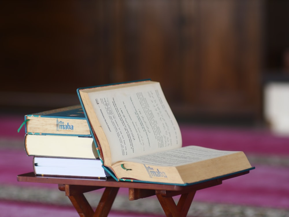 a stack of books on a table