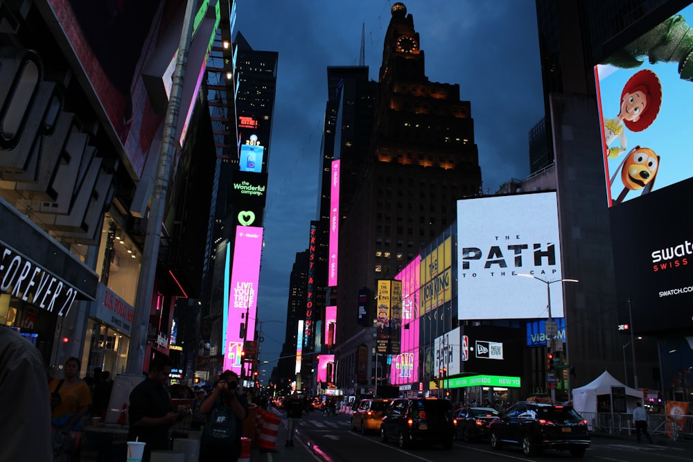 a city street with many billboards