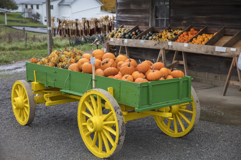 a cart full of pumpkins