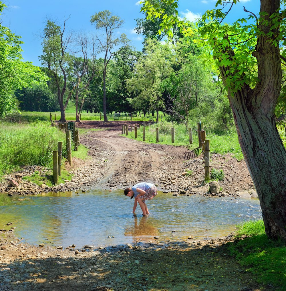 a person standing in a muddy puddle