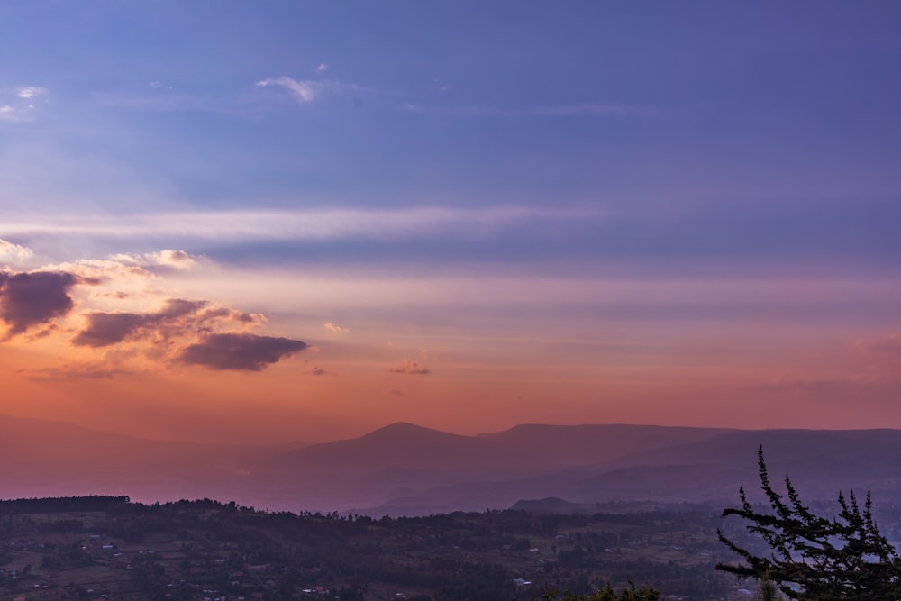 a landscape with hills and trees