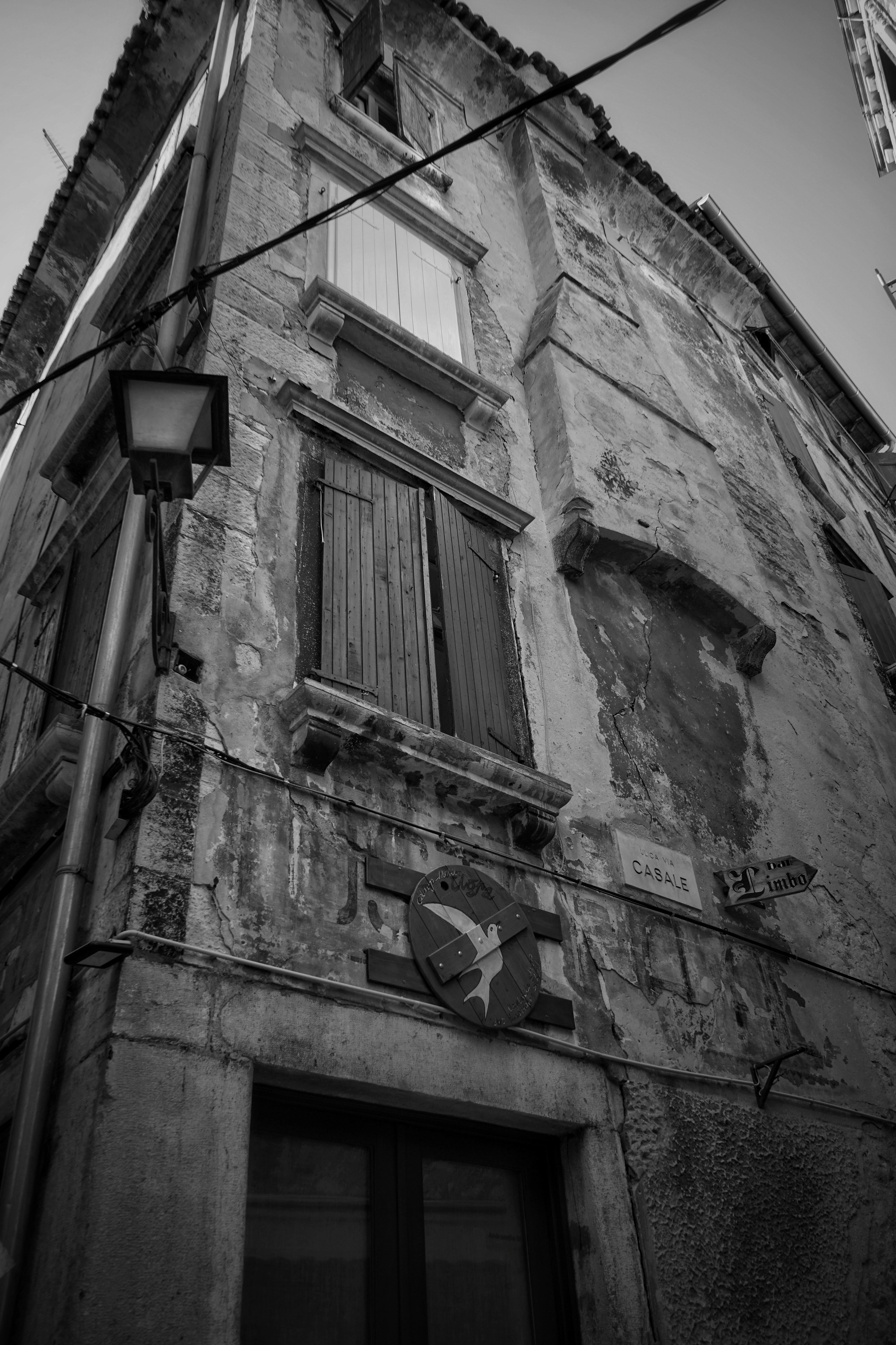 A brick building with windows photo – Free Film Image on
