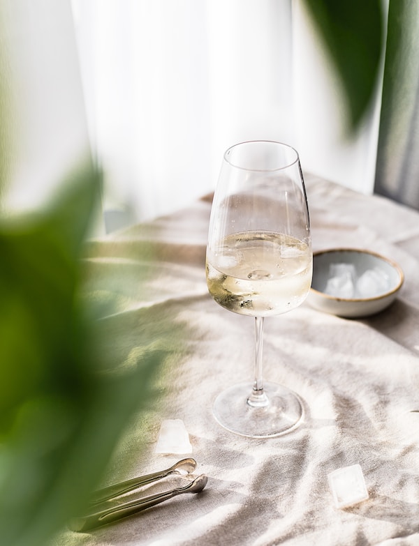 A glass of wine on a table
