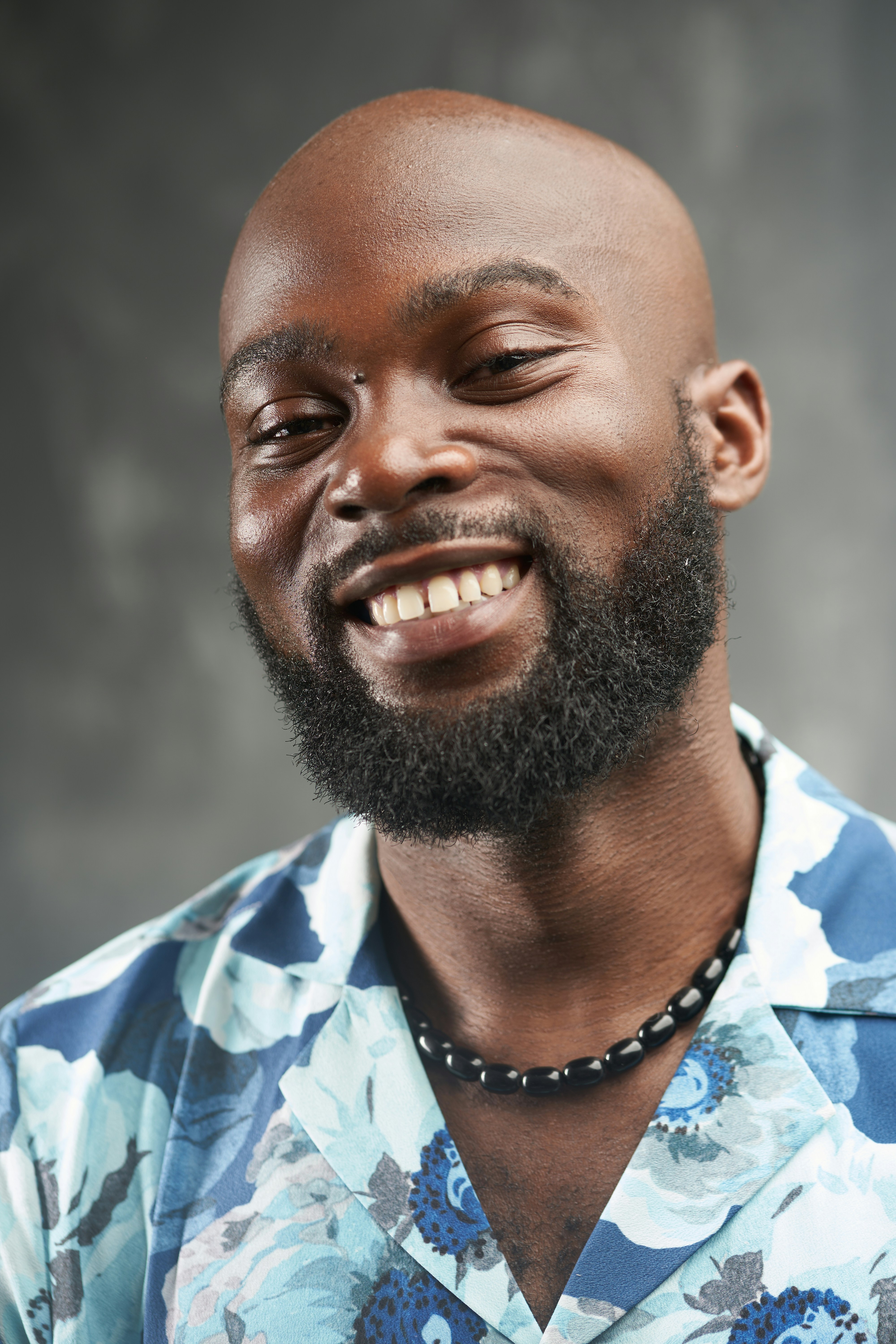 a man smiling for the camera