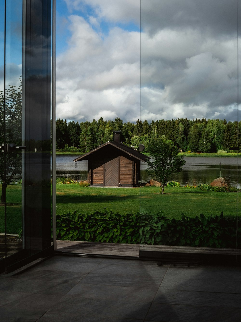 a house with a pond in the front