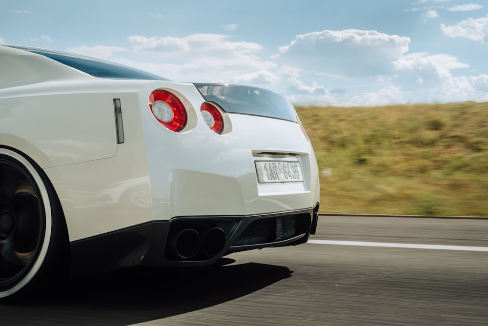 a white car on a road