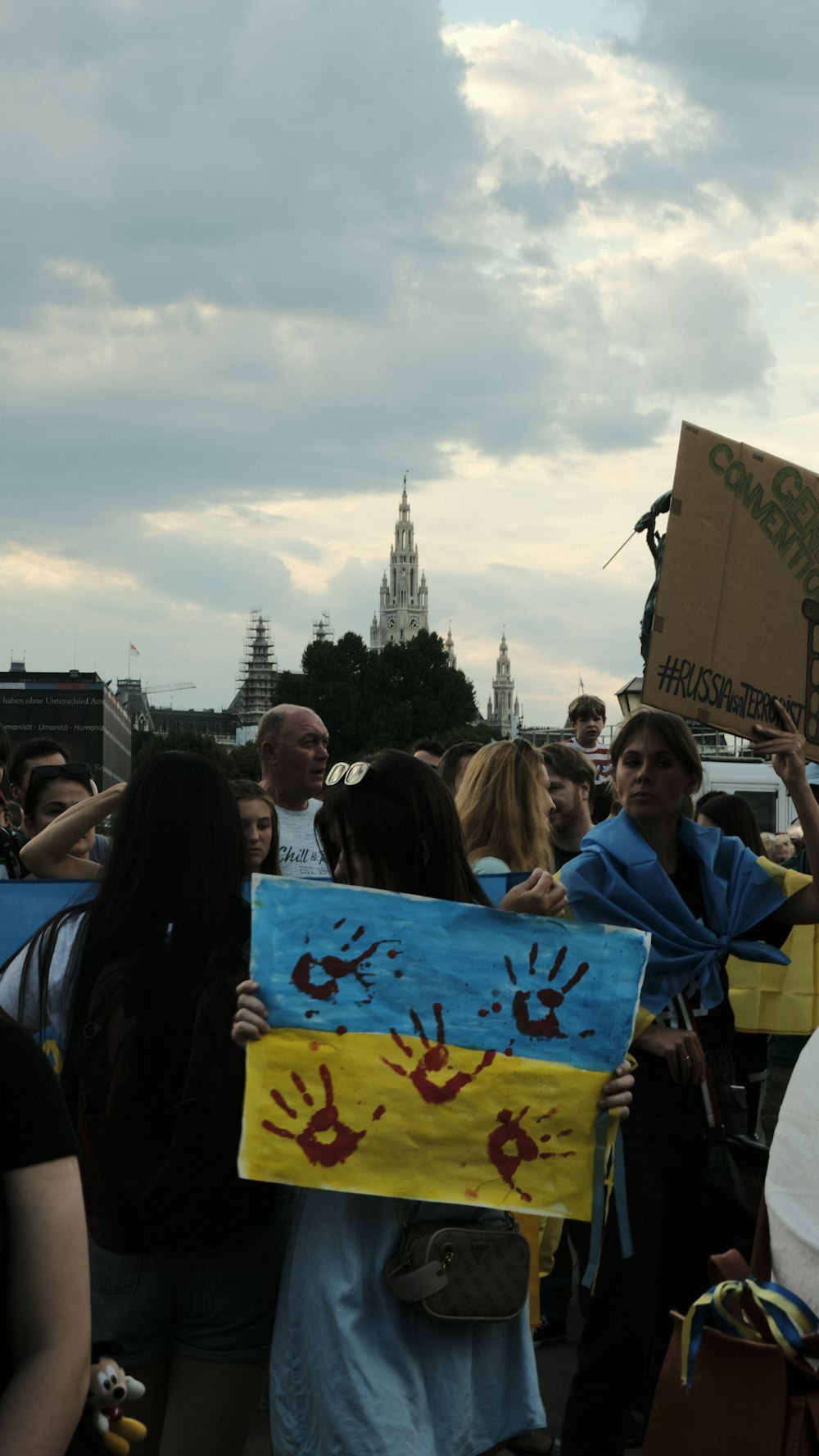 a group of people holding signs