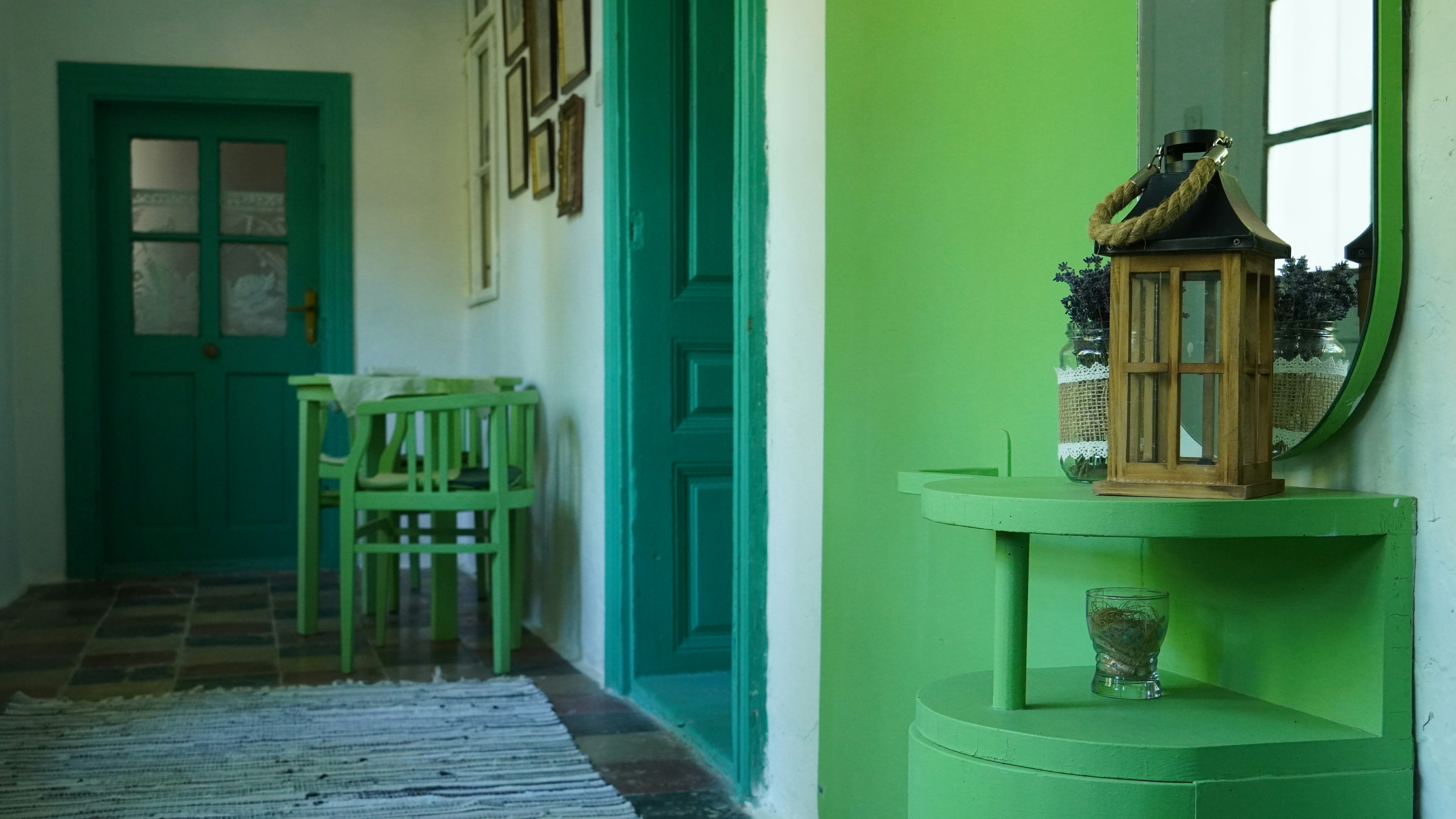 a room with a table and chairs