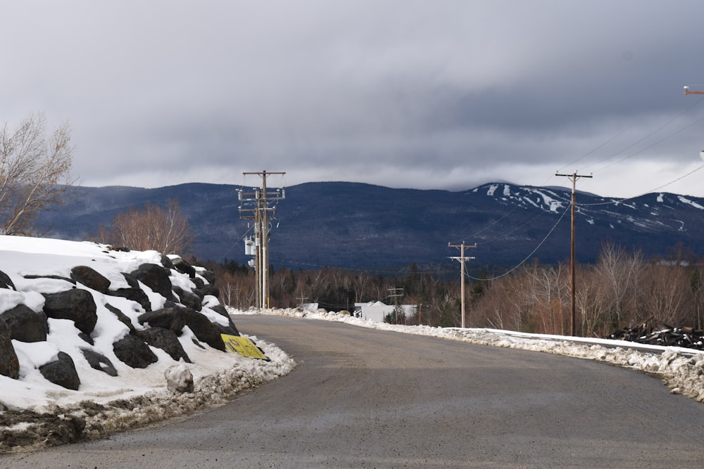 a road with snow on the side