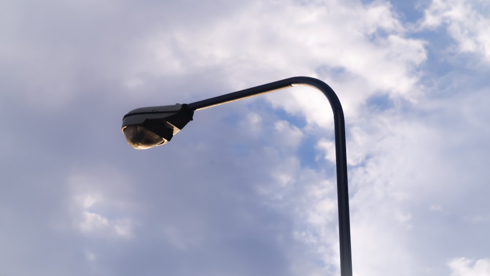 a street light with a blue sky