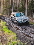 a car driving on a muddy road