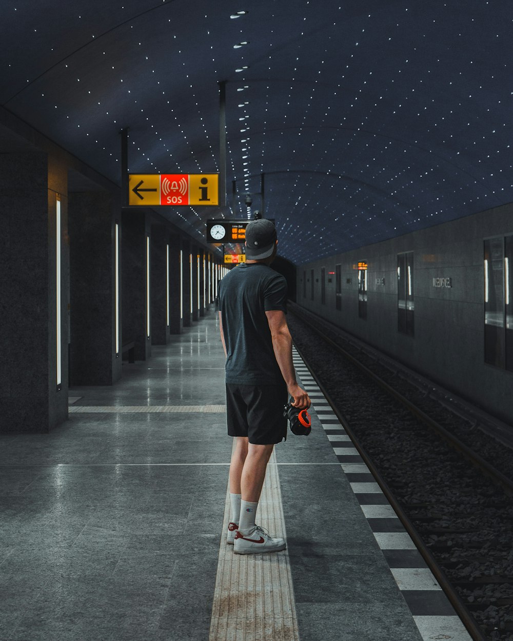 a man walking on a platform